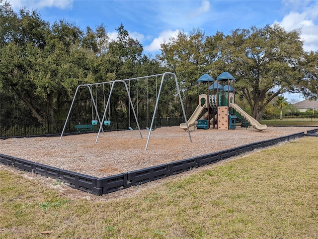 community play area with a lawn