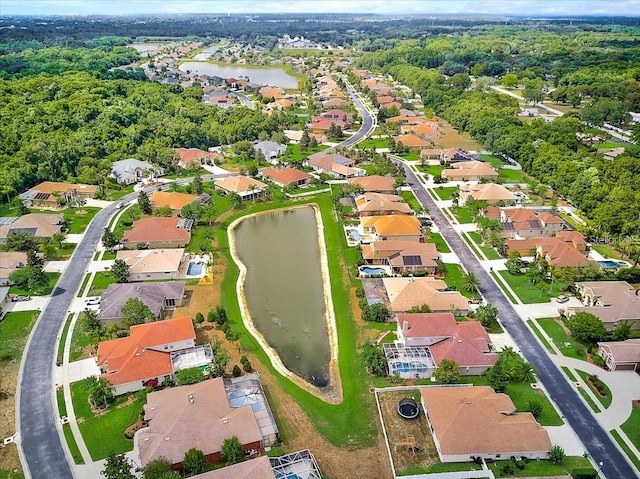 aerial view with a residential view and a water view