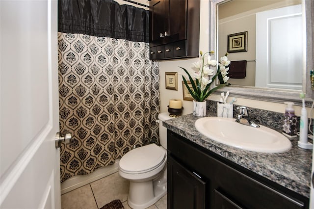 bathroom with toilet, a shower with curtain, tile patterned flooring, and vanity