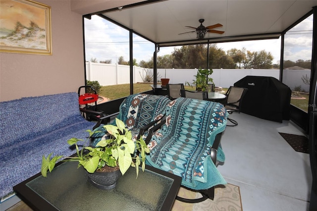 view of patio with ceiling fan, a fenced backyard, grilling area, and outdoor dining space