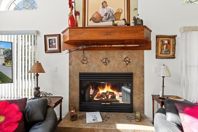 details with a tiled fireplace