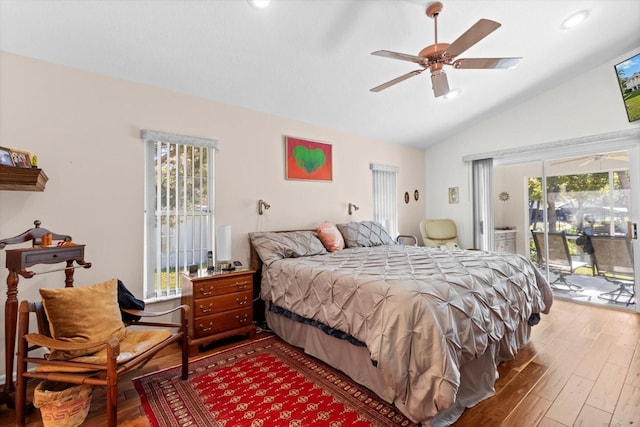 bedroom featuring a ceiling fan, lofted ceiling, wood finished floors, access to exterior, and recessed lighting