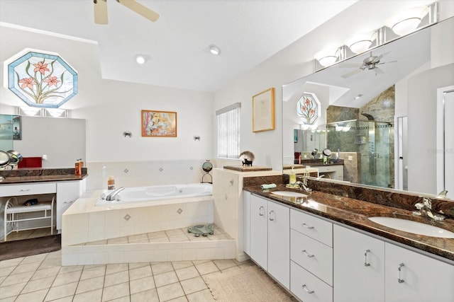 full bathroom featuring a ceiling fan, a sink, a shower stall, and a bath