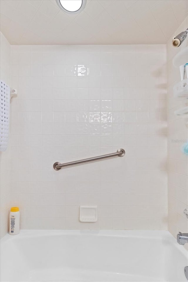 full bath with bathing tub / shower combination