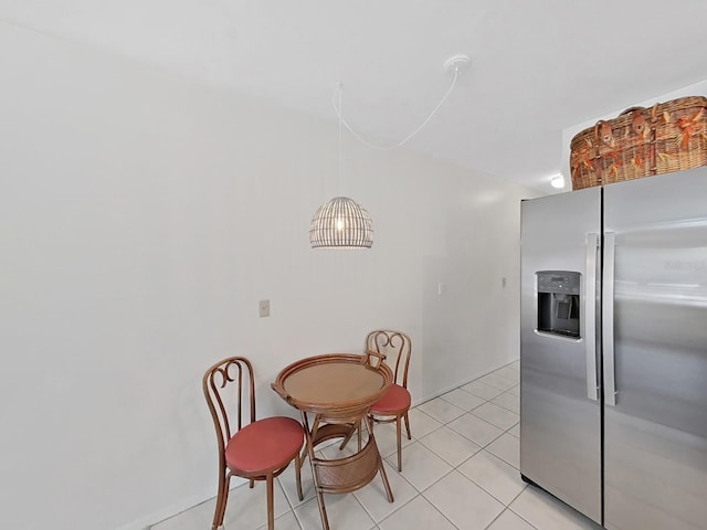 dining room with light tile patterned floors