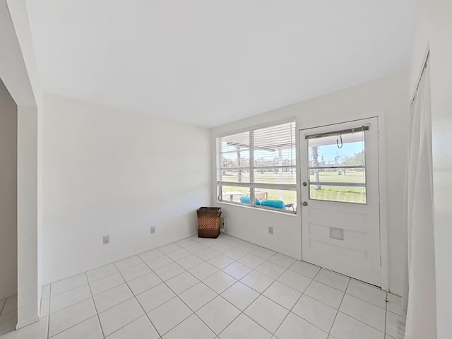 empty room featuring light tile patterned flooring