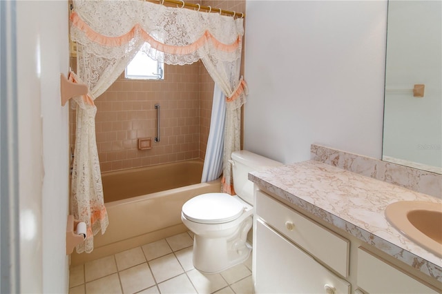 full bathroom featuring toilet, shower / bath combo, vanity, and tile patterned floors