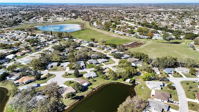 aerial view with a water view and a residential view