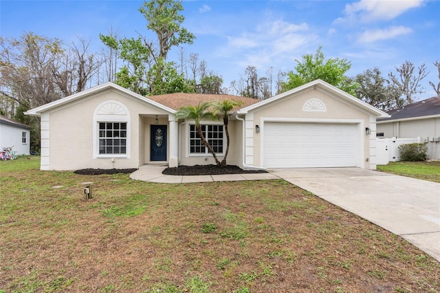 ranch-style house featuring a garage, fence, concrete driveway, stucco siding, and a front lawn