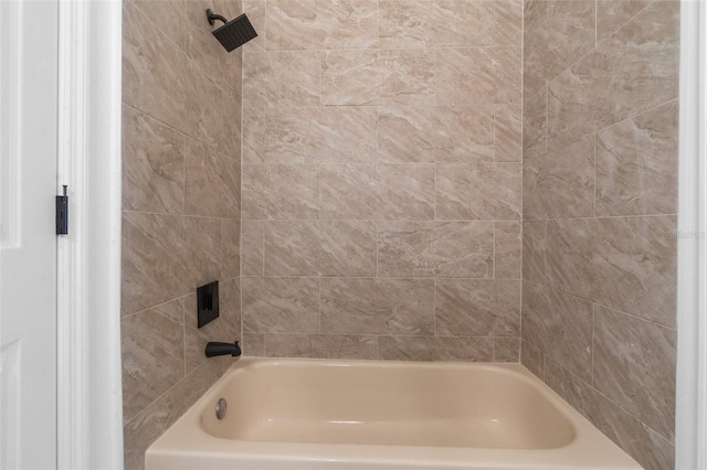 full bath featuring bathing tub / shower combination