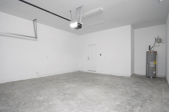 garage with electric water heater and a garage door opener