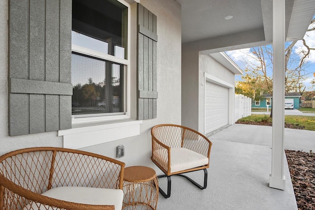 view of patio / terrace with concrete driveway