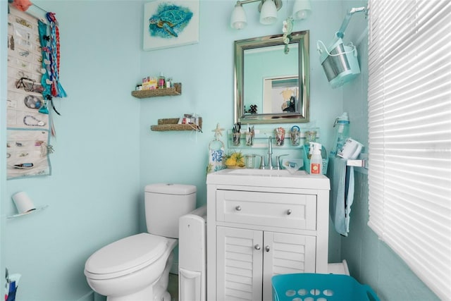 half bath with toilet and vanity