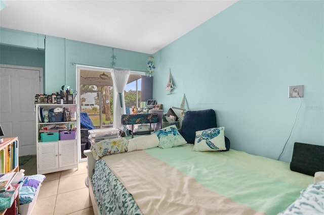 bedroom with light tile patterned floors