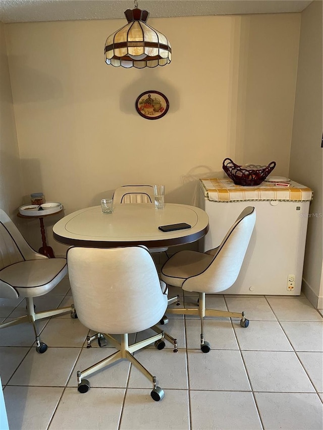 dining room with light tile patterned floors