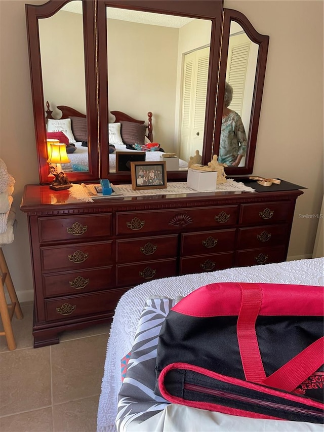 bedroom with tile patterned flooring