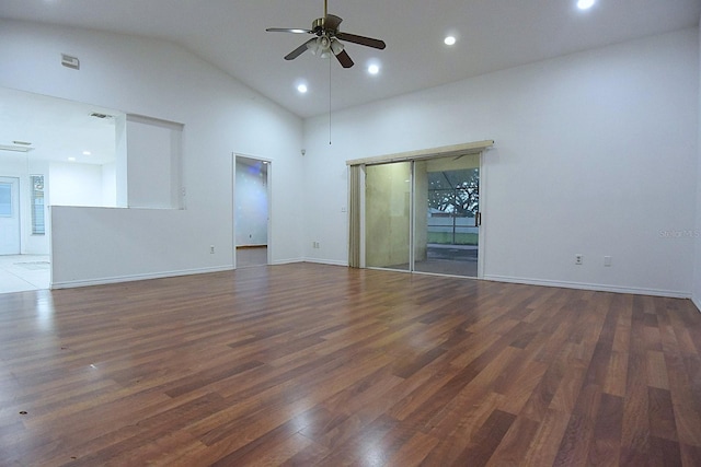 unfurnished room featuring baseboards, ceiling fan, wood finished floors, high vaulted ceiling, and recessed lighting