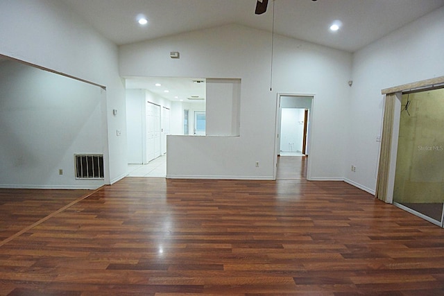 unfurnished living room featuring visible vents, ceiling fan, wood finished floors, high vaulted ceiling, and recessed lighting