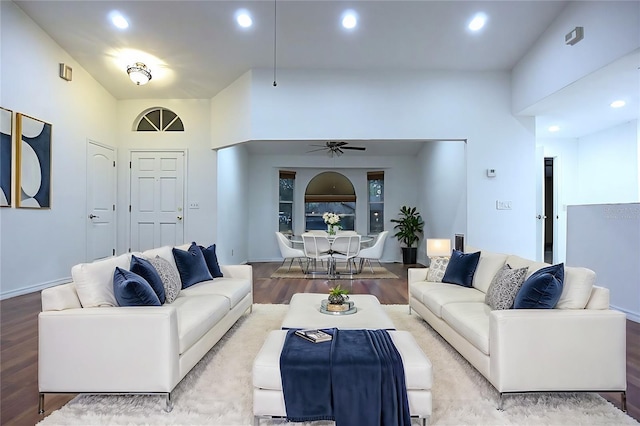 living room featuring recessed lighting, ceiling fan, and wood finished floors