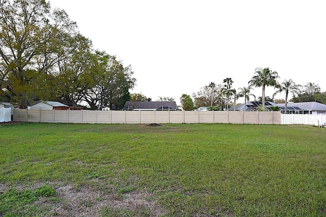 view of yard with fence