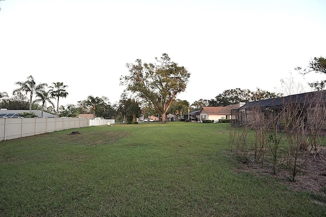 view of yard with fence