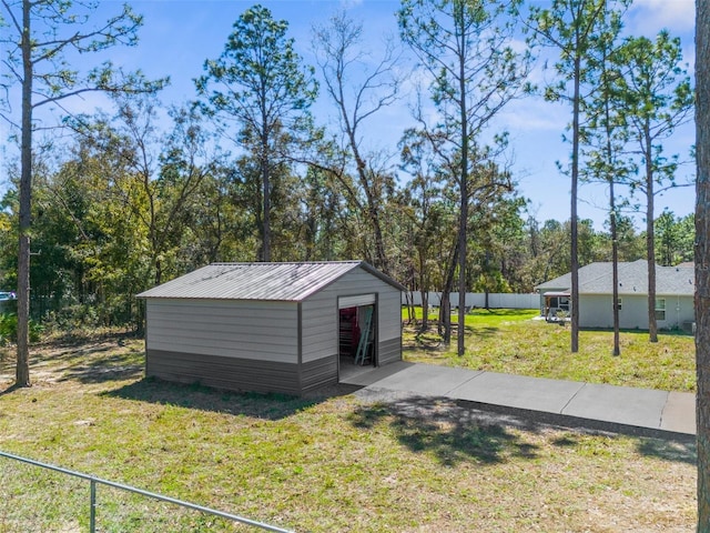 view of outdoor structure featuring an outbuilding