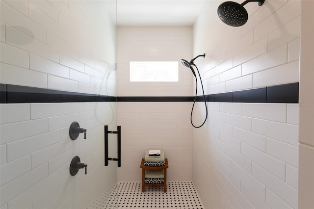 full bathroom with a tile shower