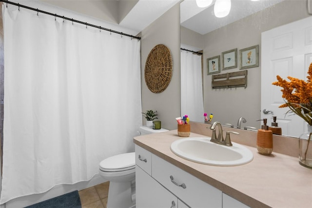 full bathroom featuring tile patterned floors, toilet, and vanity