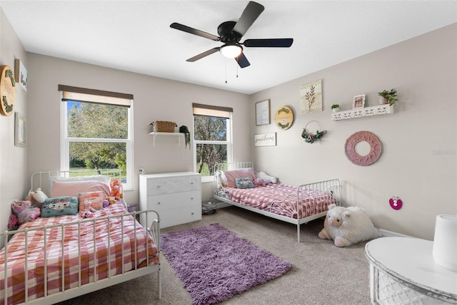 bedroom featuring carpet flooring and ceiling fan