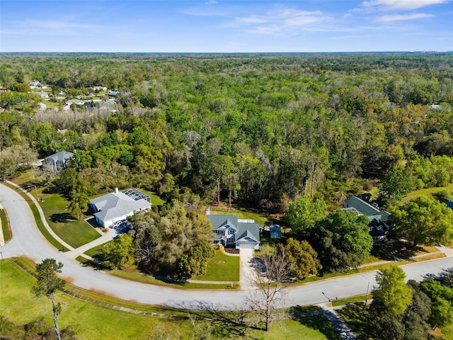 bird's eye view featuring a view of trees