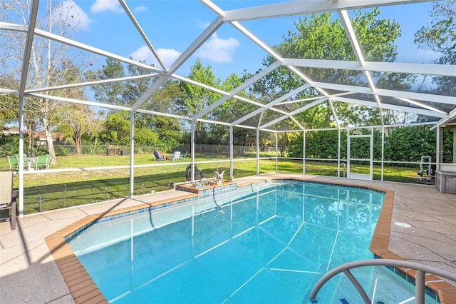 outdoor pool with a yard and glass enclosure