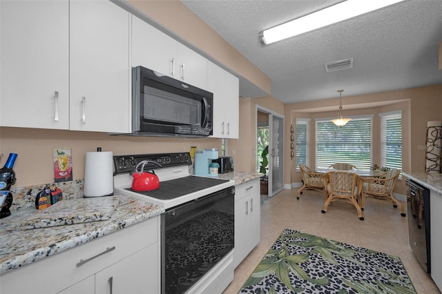 kitchen with visible vents, black appliances, pendant lighting, a textured ceiling, and white cabinetry