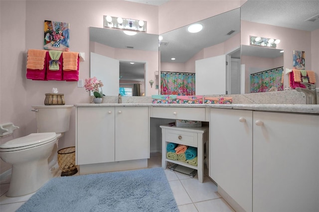 bathroom featuring tile patterned flooring, visible vents, toilet, a shower with shower curtain, and vanity