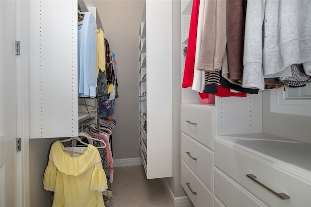 walk in closet featuring tile patterned floors