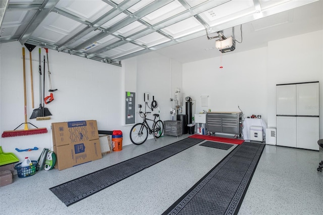 garage with a sink and a garage door opener