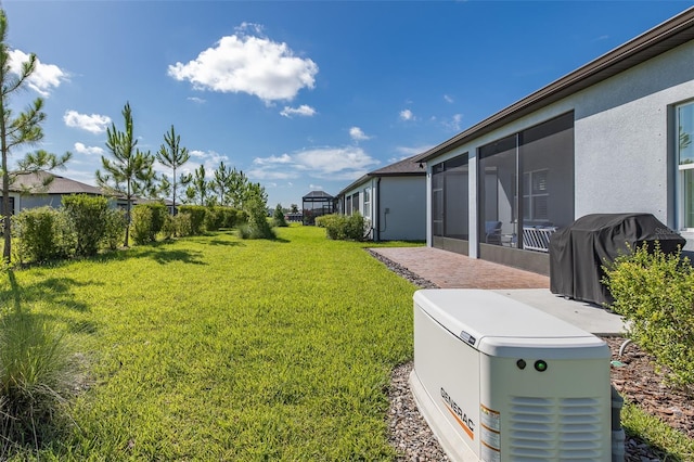 view of yard featuring a sunroom