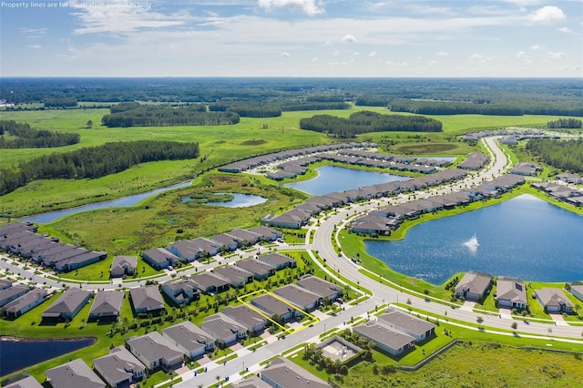 aerial view with a water view and a residential view