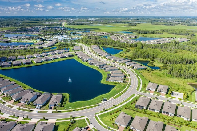 birds eye view of property featuring a water view and a residential view