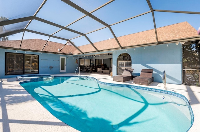 view of swimming pool with an outdoor living space, a pool with connected hot tub, glass enclosure, a patio area, and a ceiling fan