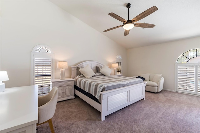 bedroom with a ceiling fan, light colored carpet, and high vaulted ceiling