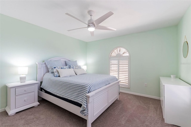 bedroom with baseboards, light colored carpet, and ceiling fan