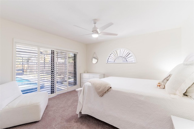 bedroom featuring a ceiling fan, access to outside, and carpet