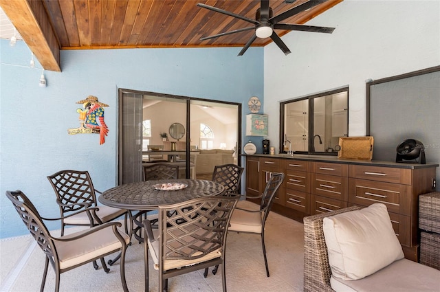 dining area with wooden ceiling, a ceiling fan, and vaulted ceiling