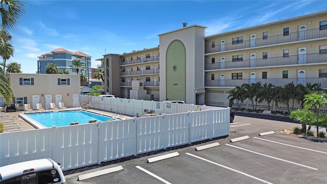 community pool featuring fence