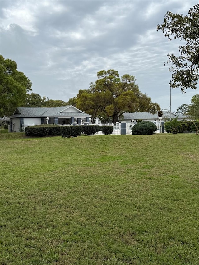 view of yard featuring fence