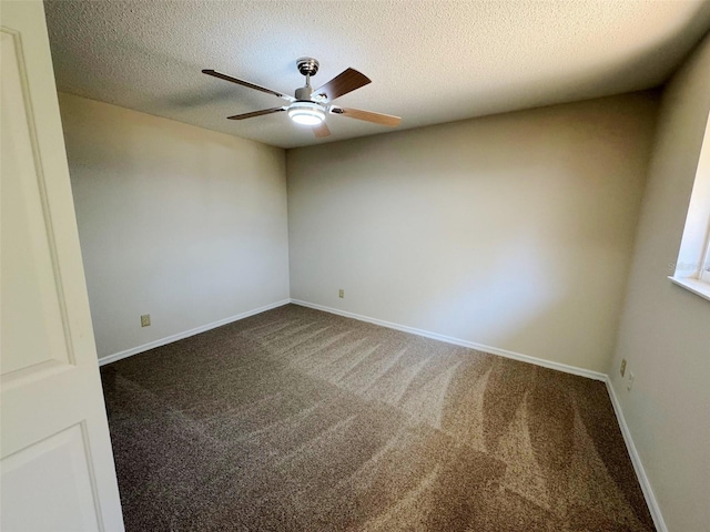 spare room featuring baseboards, carpet floors, a textured ceiling, and a ceiling fan