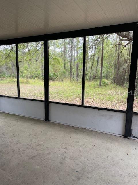 unfurnished sunroom with a healthy amount of sunlight