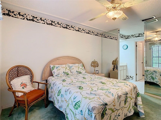 carpeted bedroom featuring ceiling fan