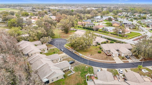 aerial view featuring a residential view and a water view