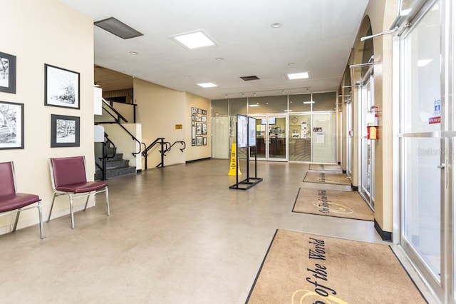 building lobby featuring stairs and visible vents